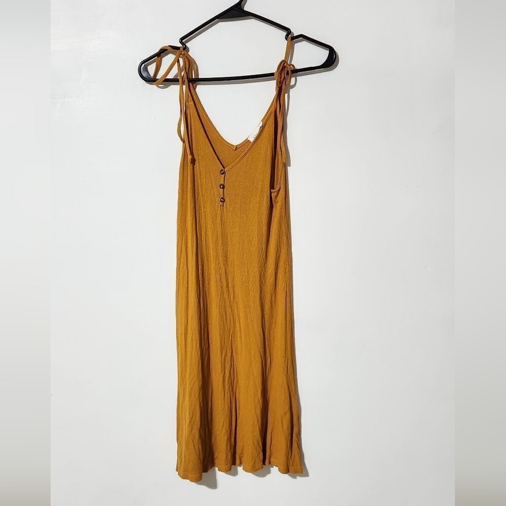 Every sleeveless open v neck mustard mini dress